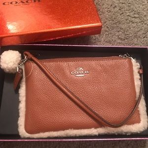 Coach shearling trim leather wristlet- NWT